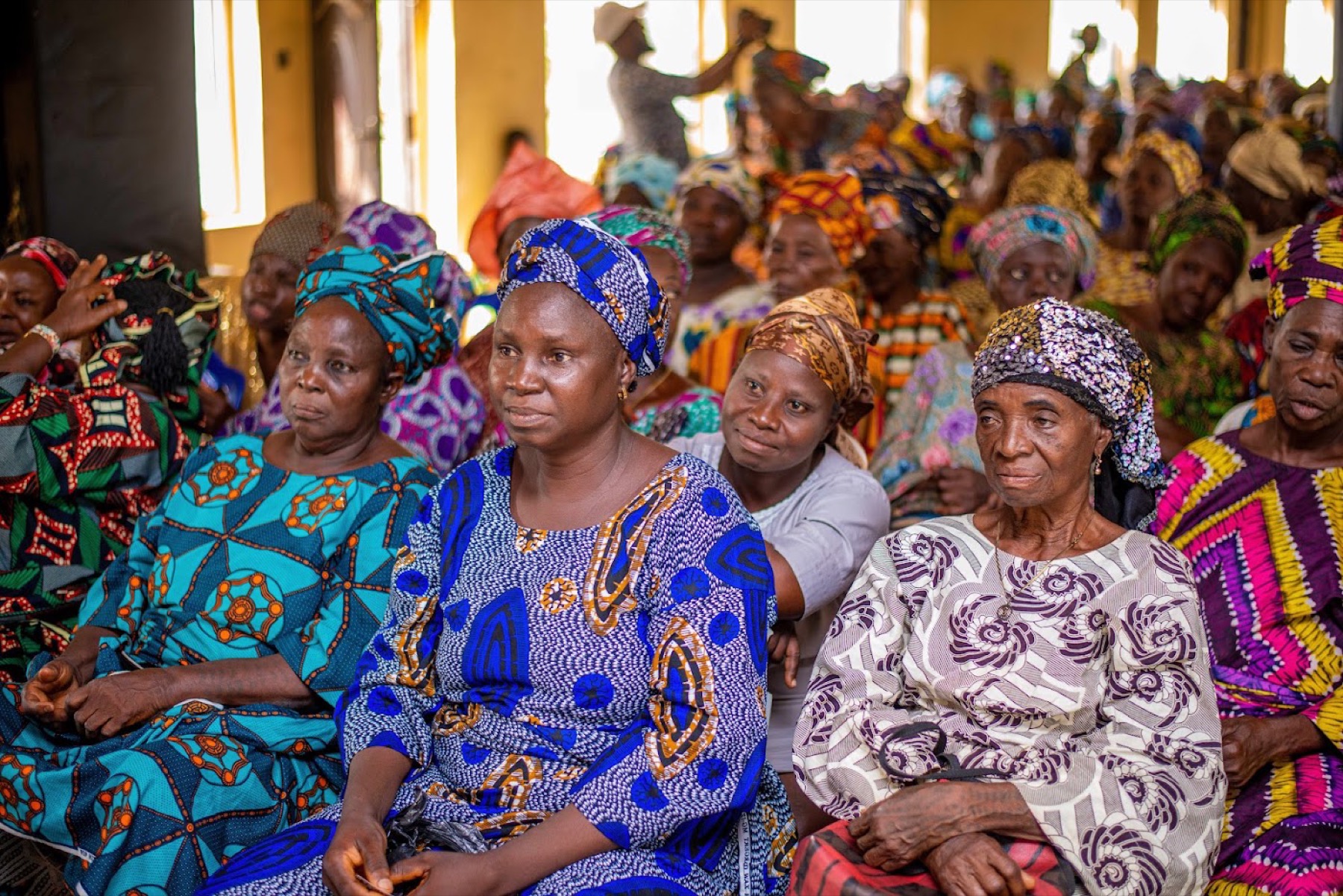 Women seated together at a foundation gathering.